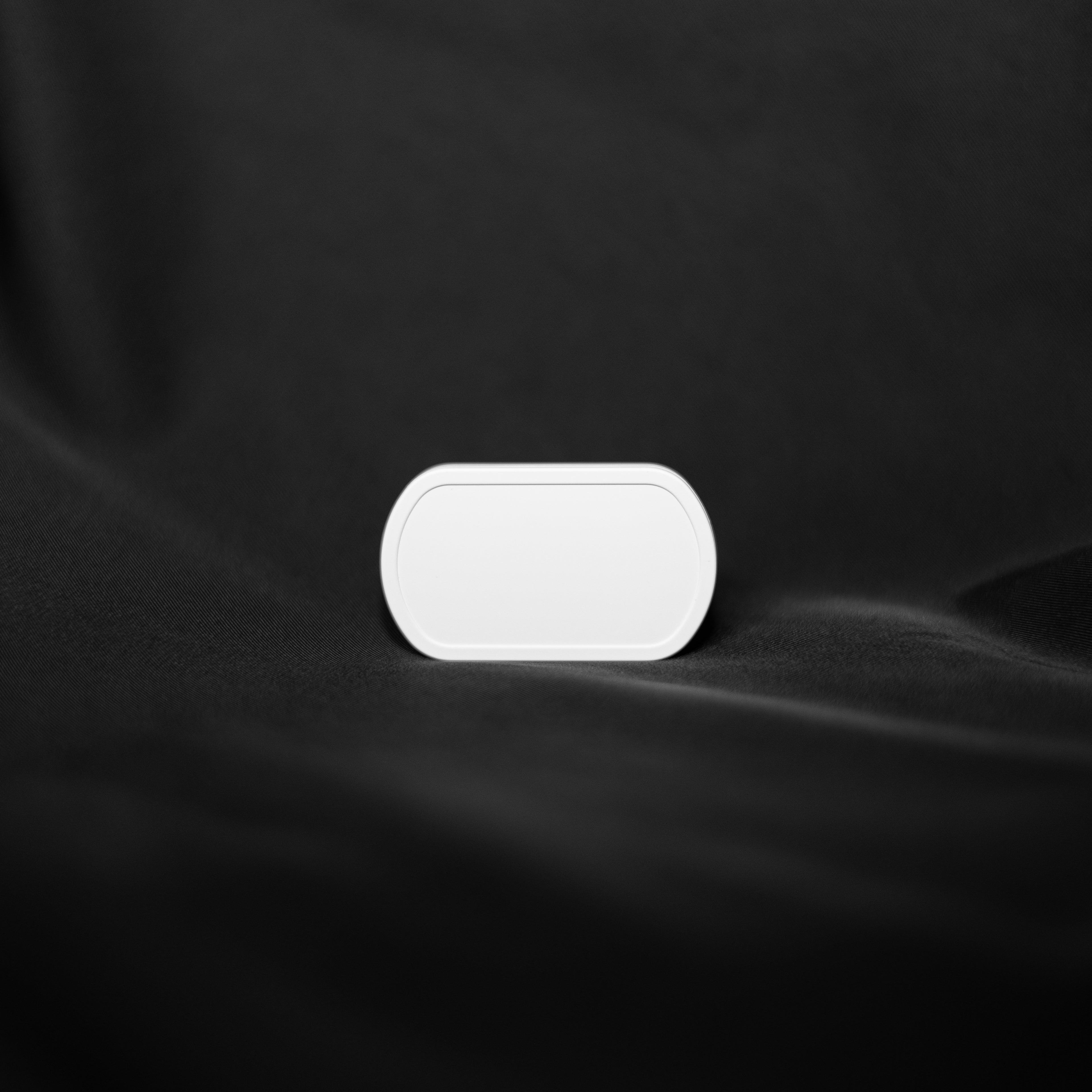 White electronic device, smart humidity and temperature sensor. SmartCocoon.